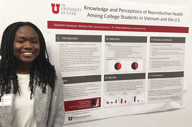 elizabeth izampuye with her research poster